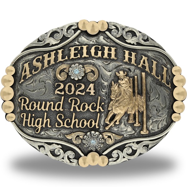 A custom rodeo belt buckle for Round Rock High School featuring a pole bending cowgirl figure